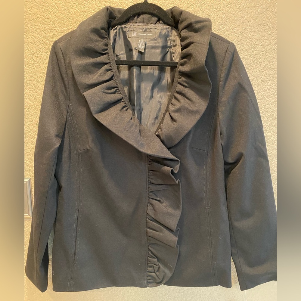 INC women’s black dress jacket with ruffle neckline. This is a beautiful jacket.